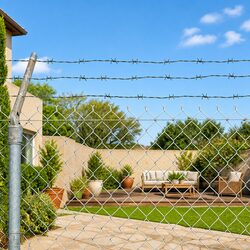 Practical Uses of 100m Green Barbed Wire for Fencing