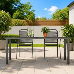Versatile Black Glass Top Table for Patios and Gardens